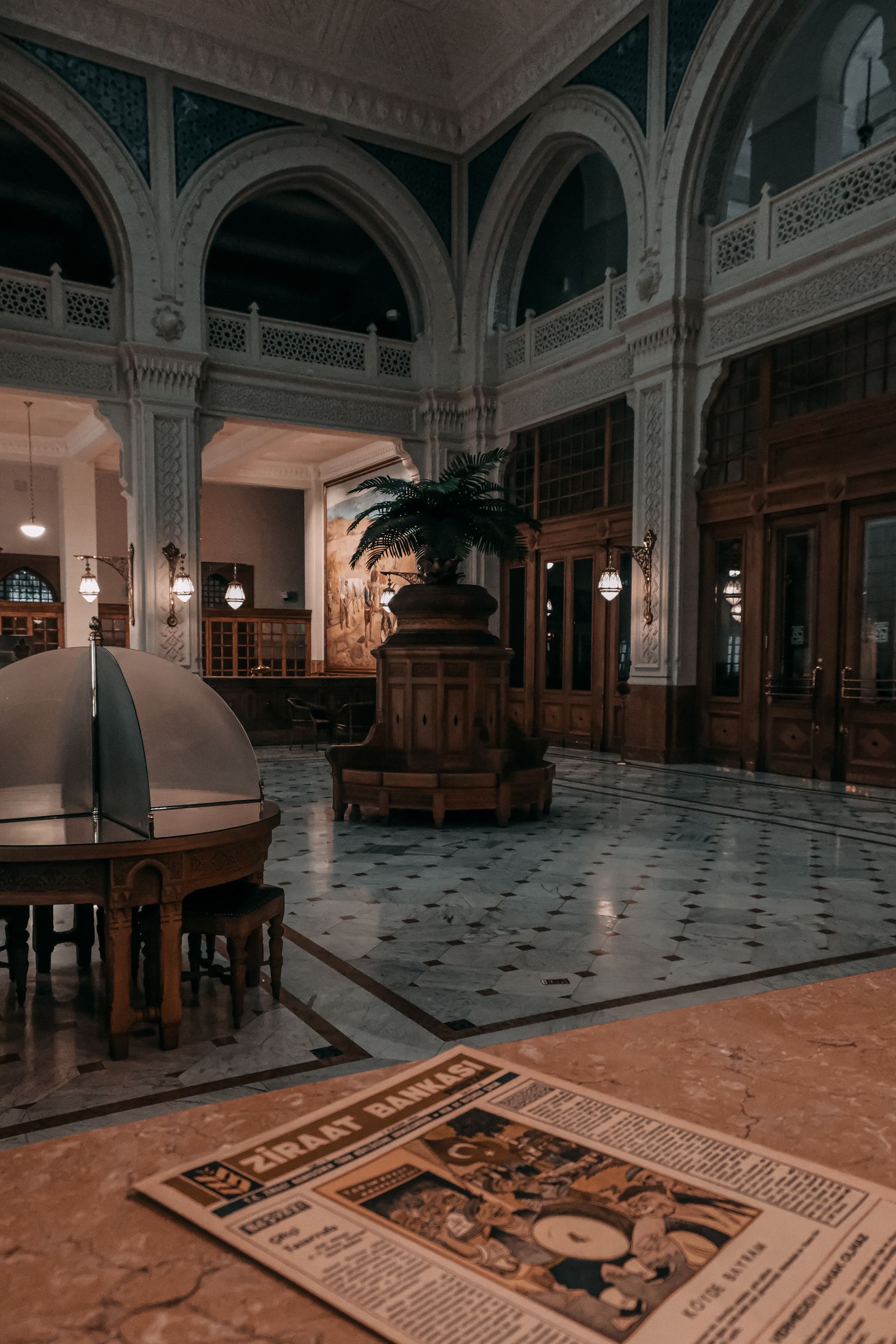 The historic Ziraat Bank hall with marble floors and carved wood